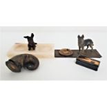 COLD PAINTED BRONZE depicting a German Shepard dog on a rug with a large bowl, 15.5cm long, a cold