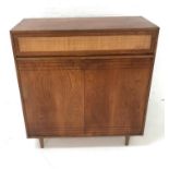 LARGE TEAK SIDE CABINET with an oblong top above a frieze drawer with a woven panel front, above a