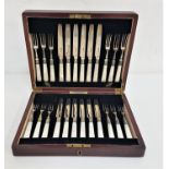 CASED SET OF TWELVE SILVER FRUIT KNIVES AND FORKS with mother of pearl handles, marked Sheffield