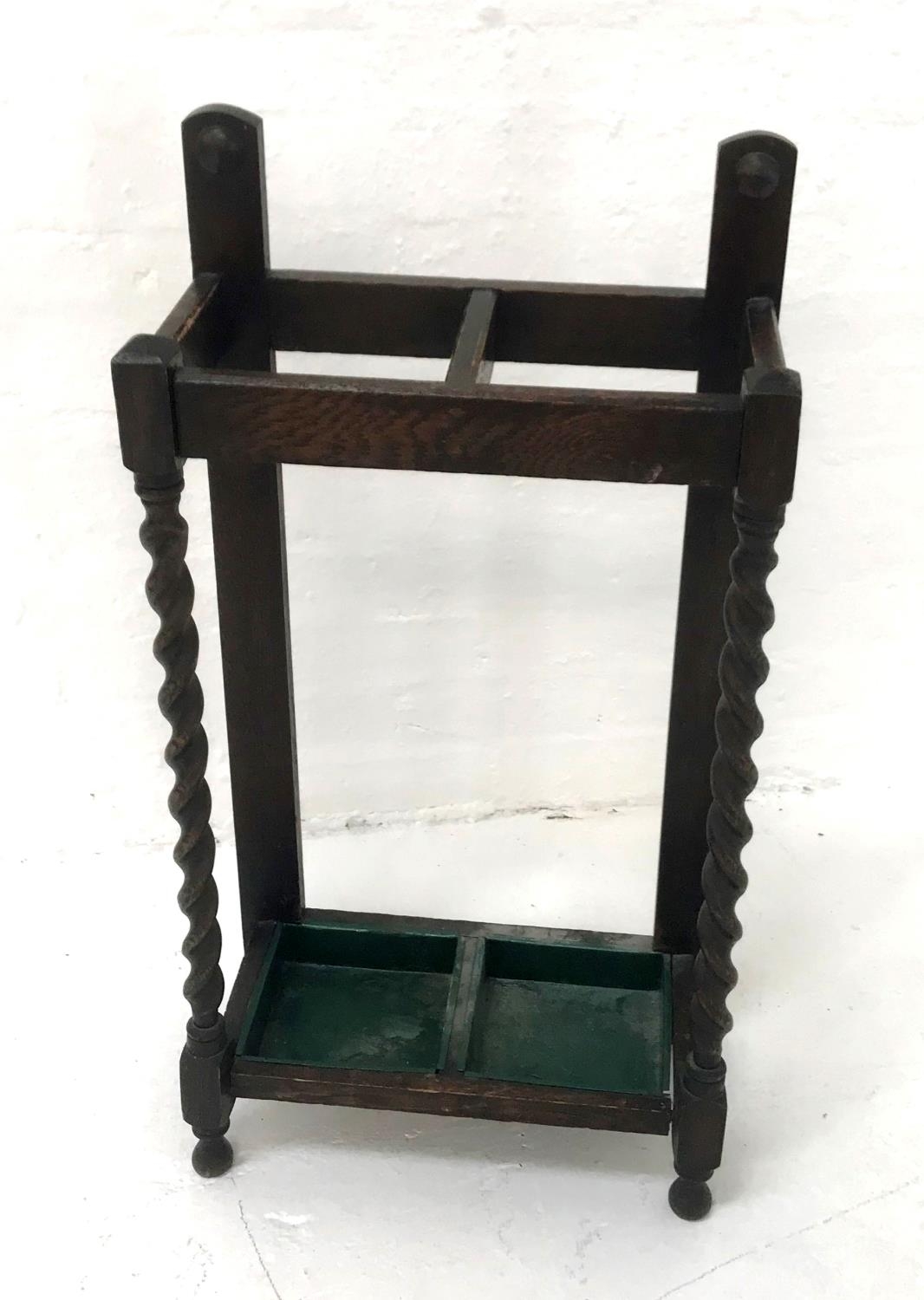 OAK ARTS AND CRAFTS STICK STAND with two divisions and barley twist front columns, with two metal