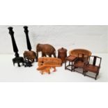 SELECTION OF CARVED WOODEN ITEMS including a pair of miniature Chinese armchairs and matching table,