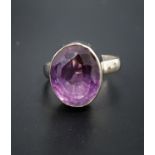 AMETHYST SINGLE STONE RING the large oval cut amethyst approximately 12cts, on unmarked silver