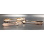 THREE PAIRS OF SILVER SUGAR TONGS the largest pair with shell and scroll detail, Glasgow 1830;