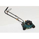 B & Q LAWN MOWER with a petrol engine and 39cm cut