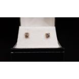 PAIR OF DIAMOND STUD EARRINGS the round brilliant cut diamonds totaling approximately 0.4cts, in