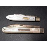 TWO SILVER BLADE AND MOTHER OF PEARL FRUIT KNIVES one Victorian example with rubbed marks, the other