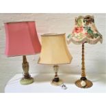 TWO ALABASTER TABLE LAMPS both with shades; together with a brass tapering table lamp (3)