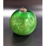 VICTORIAN GREEN GLASS WITCH BALL approximately 8.5cm diameter