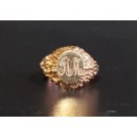 NINE CARAT GOLD SIGNET RING the central oval panel with engraved M in textured gold surround, ring