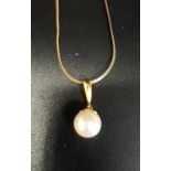PEARL DROP PENDANT on nine carat gold chain (damaged), the chain weighing approximately 1.8 grams