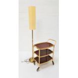 GILT METAL HOSTESS TROLLEY the three tier trolley with removable tray top; together with a brass