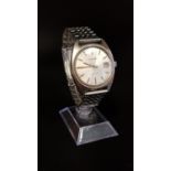 1970s GENTLEMAN'S 'GARRARD AUTOMATIC' STAINLESS STEEL WRISTWATCH with baton markers and date