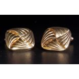 PAIR OF NINE CARAT GOLD CUFFLINKS with entwined knot style decoration, approximately 6 grams