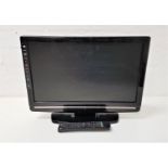 DIGIHOME COLOUR TELEVISION ON STAND with 18" screen and one HDMI port, with remote control