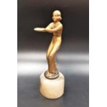 ART DECO GILT BRONZE FIGURINE the female figure with bent knees and outstretched arms, raised on