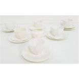 ROYAL CROWN DERBY TEA SERVICE in plain white and comprising six cups, five saucers, six side