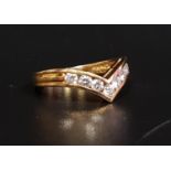 DIAMOND SET WISHBONE RING the seven channel set round brilliant cut diamonds totaling