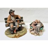 TWO CAPODIMONTE PORCELAIN FIGURINES one depicting a hobo sat on a bench with doves around him, 22.