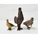 TWO COLD PAINTED BRONZE BIRDS comprising a Curlew, 6cm high and a hen pheasant, 5cm high; together