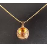 CITRINE SINGLE STONE PENDANT the oval cut citrine in nine carat gold mount and on nine carat gold