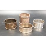 THREE SILVER NAPKIN RINGS one Birmingham 1919, the other two with indistinct Birmingham marks;