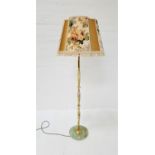 ALABASTER STANDARD LAMP raised on a circular base with an alabaster and gilt metal column, with a