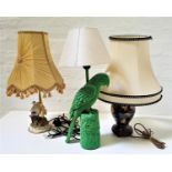 GREEN VELVET PARROT TABLE LAMP with a cream hessian shade, 59cm high; a black ground ginger jar lamp