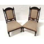 PAIR OF EDWARDIAN MAHOGANY NURSING CHAIRS with carved fan shape top rails above a padded back