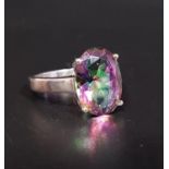 MYSTIC TOPAZ SINGLE STONE RING the oval cut topaz approximately 5.5cts, on silver shank, ring size P