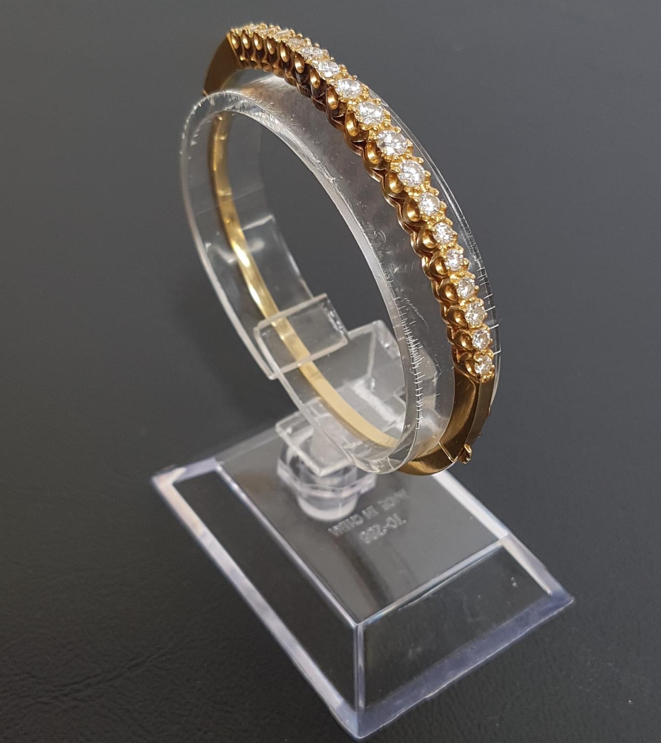 DIAMOND SET EIGHTEEN CARAT GOLD BANGLE the hinged bangles set with graduated round brilliant cut - Image 2 of 2