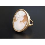 LARGE CANMEO DRESS RING the oval cameo depicting a female bust in profile, on nine carat gold shank,