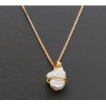 BAROQUE PEARL PENDANT in eighteen carat gold mount and on unmarked gold neck chain (clasp lacking)