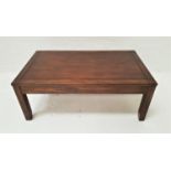 STAINED TEAK OCCASIONAL TABLE with a rectangular top, standing on shaped supports, 97cm wide