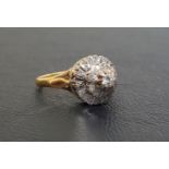 DIAMOND CLUSTER RING the multi diamonds in stepped setting totaling approximately 0.3cts, on