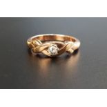 DIAMOND SOLITAIRE RING the diamond approximately 0.15cts on nine carat gold shank with twist