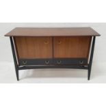 G PLAN DARK TEAK SIDEBOARD with a moulded top above two cupboard doors with drawers below,