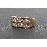 DIAMOND SET NINE CARAT GOLD SIGNET RING the eight diamonds totaling approximately 0.24cts, ring size