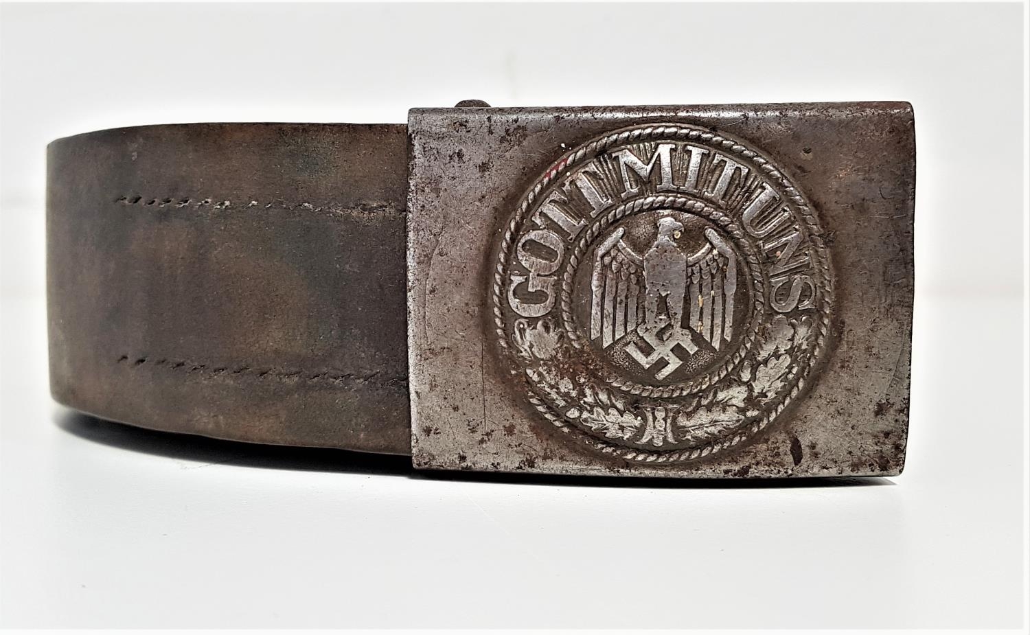 GERMAN BELT BUCKLE marked Gott Mitt Uns around an eagle and swastika on an original leather belt,