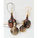 PAIR OF DRYMEN STUDIO POTTERY LAMPS of bulbous form and decorated with brown, black and green glaze,