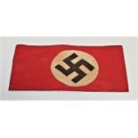 GERMAN THIRD REICH NSDAP PARTY ARMBAND the red cotton armband with a printed swastika to the centre