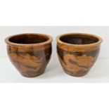 PAIR OF CHINESE POTTERY JARDINERES the brown ground decorated with dragons, 28.5cm high