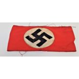GERMAN THIRD REICH NSDAP PARTY ARMBAND the red cotton armband with a multi piece black swastika to