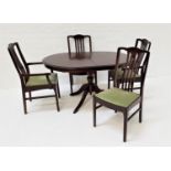 MAHOGANY EXTENDING DINING TABLE AND FOUR CHAIRS the table with a pull apart top and fold out leaf,