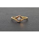 DIAMOND SOLITAIRE RING the small round cut diamond approximately 0.04cts, on eighteen carat gold