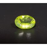 CERTIFIED LOOSE NATURAL PERIDOT the oval cut gemstone weighing 1.87cts, with ITLGR Gemstone Report