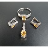 SUITE OF CITRINE AND DIAMOND JEWELLERY comprising a ring, a pair of earrings and a pendant, all in