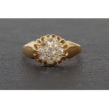DIAMOND CLUSTER RING the diamonds totaling approximately 0.42cts, on eighteen carat gold shank, ring
