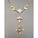 PRETTY EARLY 20th CENTURY BLUE GEM AND SEED PEARL SET PENDANT in fourteen carat gold and on attached