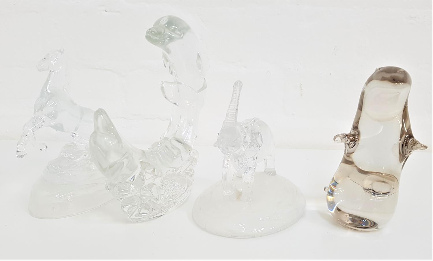 WATERFORD CRYSTAL DOLPHIN GROUP jumping through the waves, 19cm high, a glass elephant, 15cm high, a