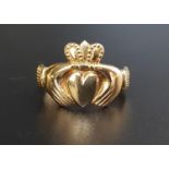 NINE CARAT GOLD CLADDAGH RING size S-T and approximately 3.9 grams
